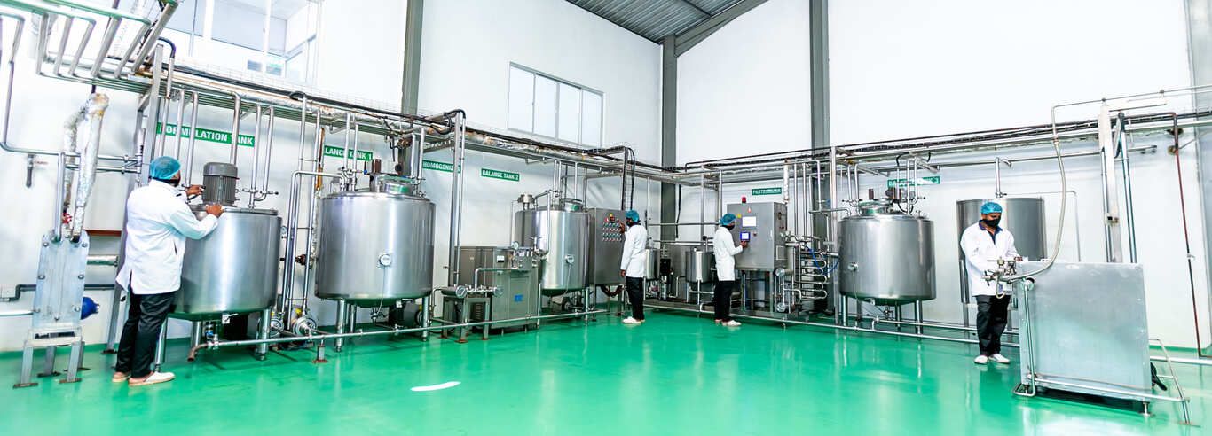 The wet-processing hall with stainless steel tanks