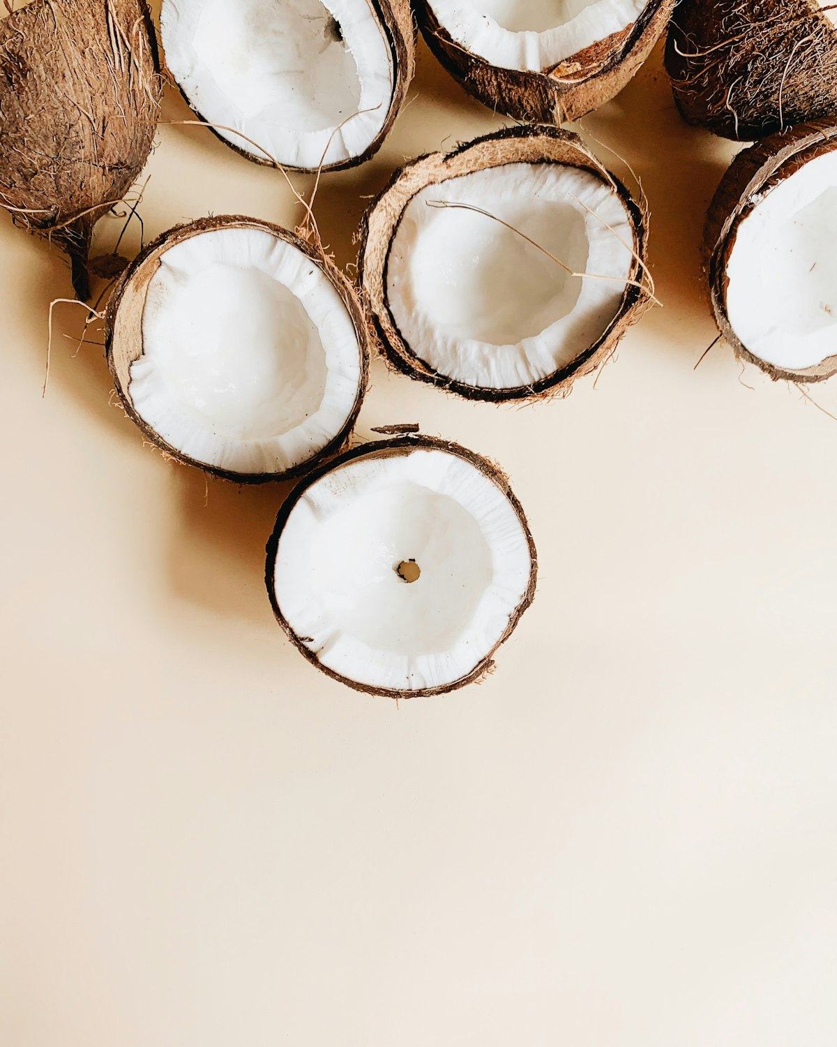Halved fresh coconuts